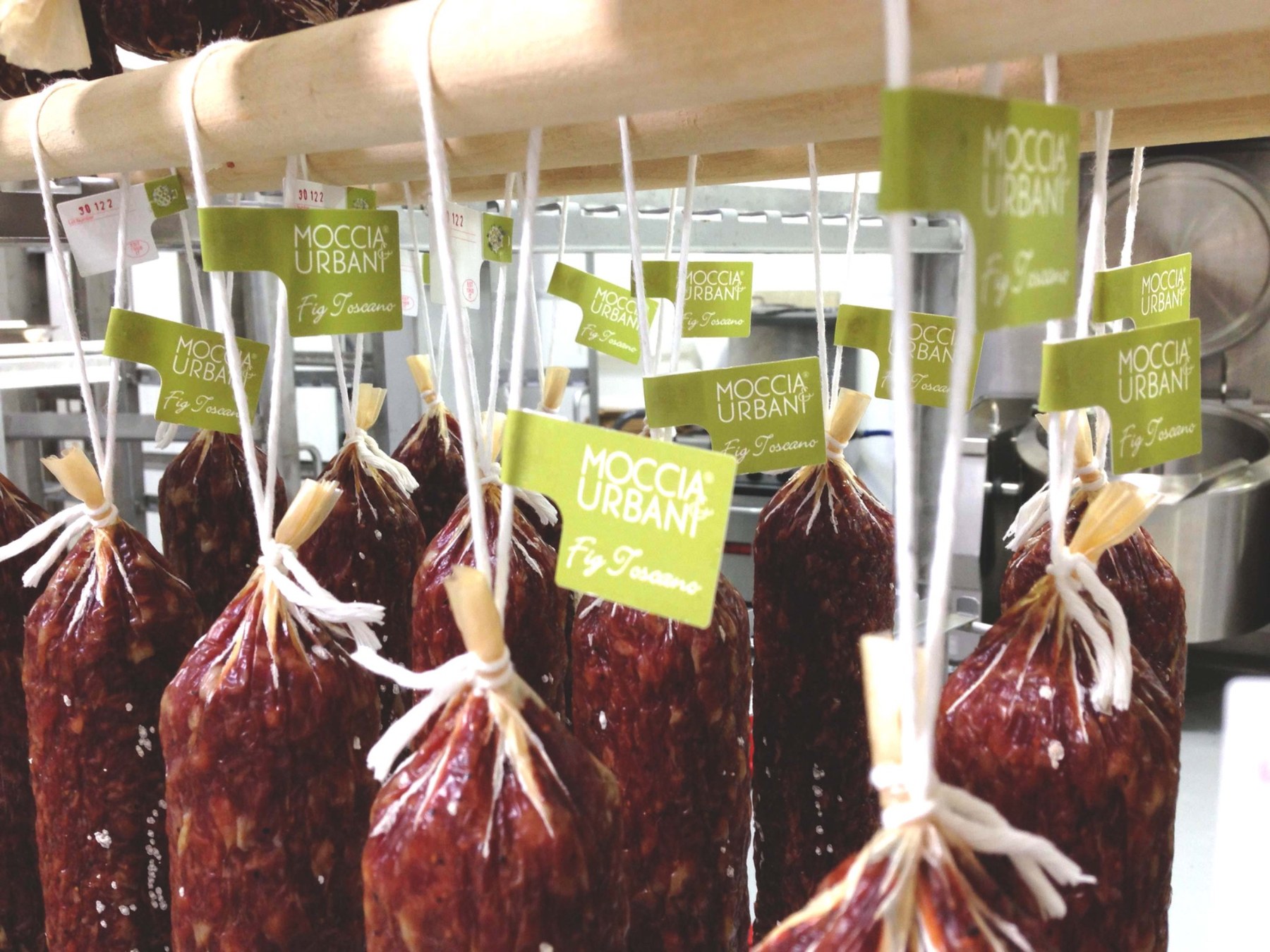 Moccia & Urbani salamis hanging in production