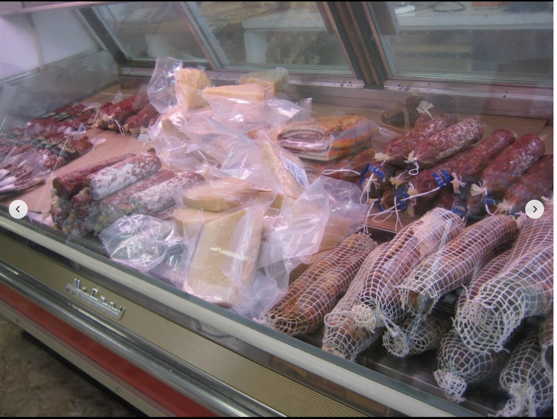 Historic deli case with salami and cheese